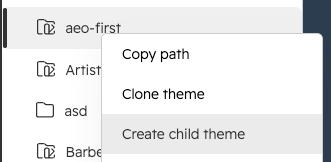 The Design Manager file tree with the right-click menu on aeo-first open and Create child theme highlighted.